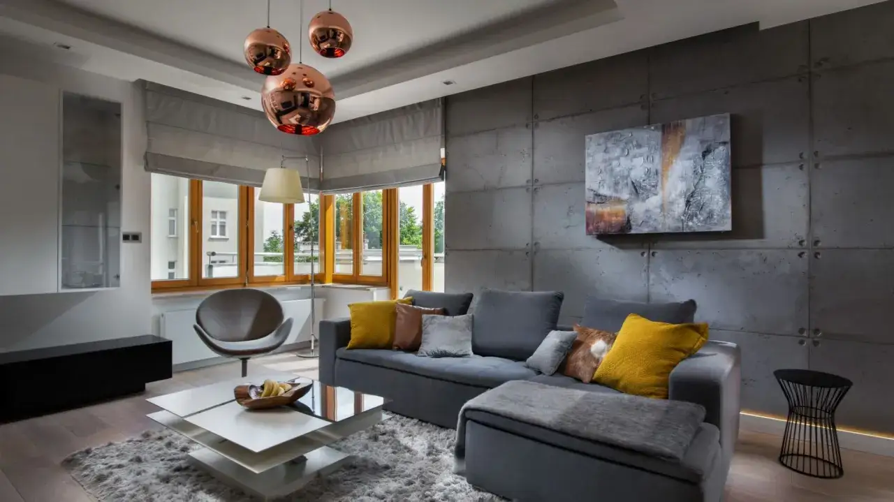 nowoczesny salon z betonową ścianą